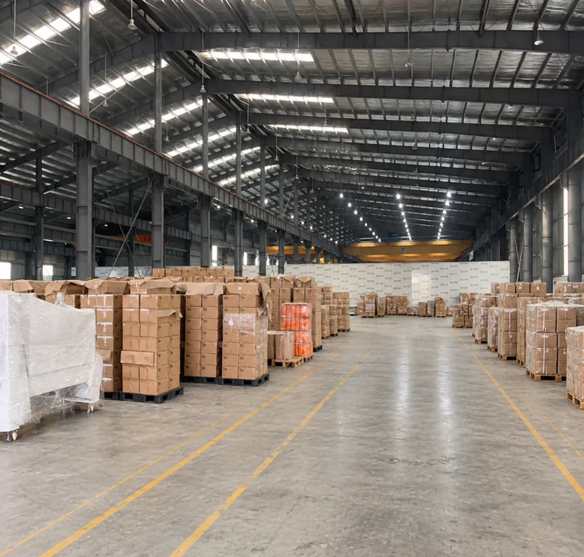 AI-edited photograph: Industrial warehouse storing packed cartons